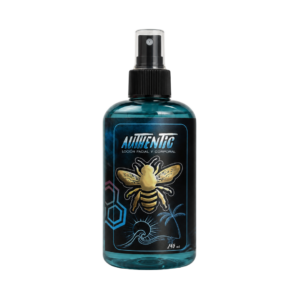 Locion facial y corporal Aureus Blue de Authentic en envase de 245 ml con atomizador negro y etiqueta con abeja dorada sobre fondo negro.